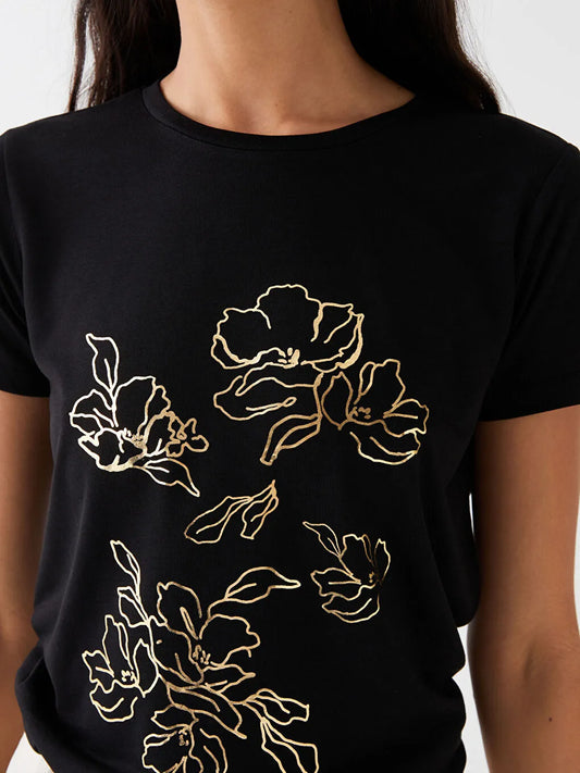 LAMINATED GOLD FLORAL ON A BLACK TEE