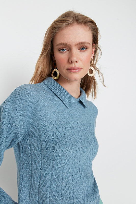 PATTERNED LEAVES ON BLUE POLO NECK SWEATER